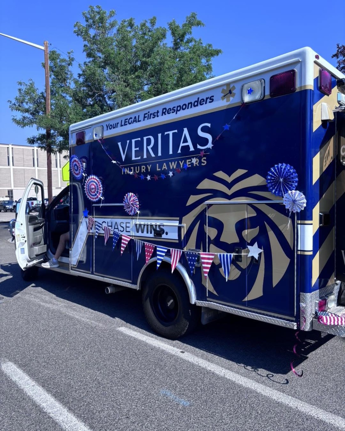 Veritas Injury Lawyers vehicle in the Grand Junction 4th of July Parade
